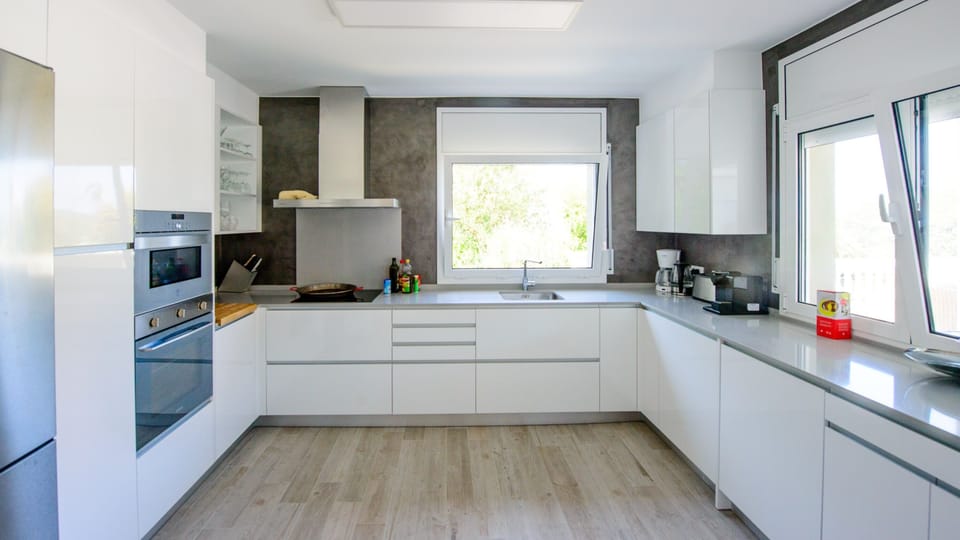The new kitchen is fully equipped with washing machine, dish washer, microwave oven and regular oven