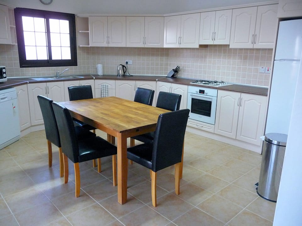 Large well equipped kitchen & dining area - will seat up to 8 persons