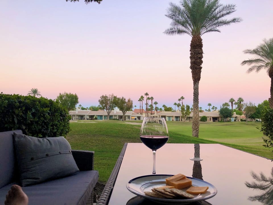 Relax with a glass of wine at sunset.