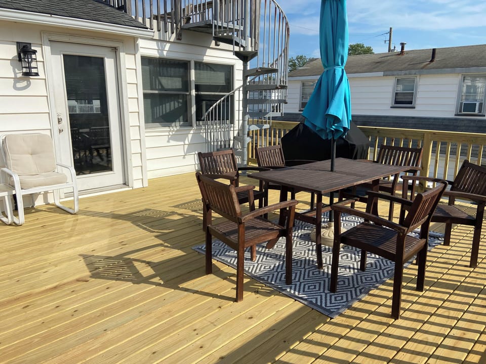2nd floor 20' deck with grill and access to the roof deck. 