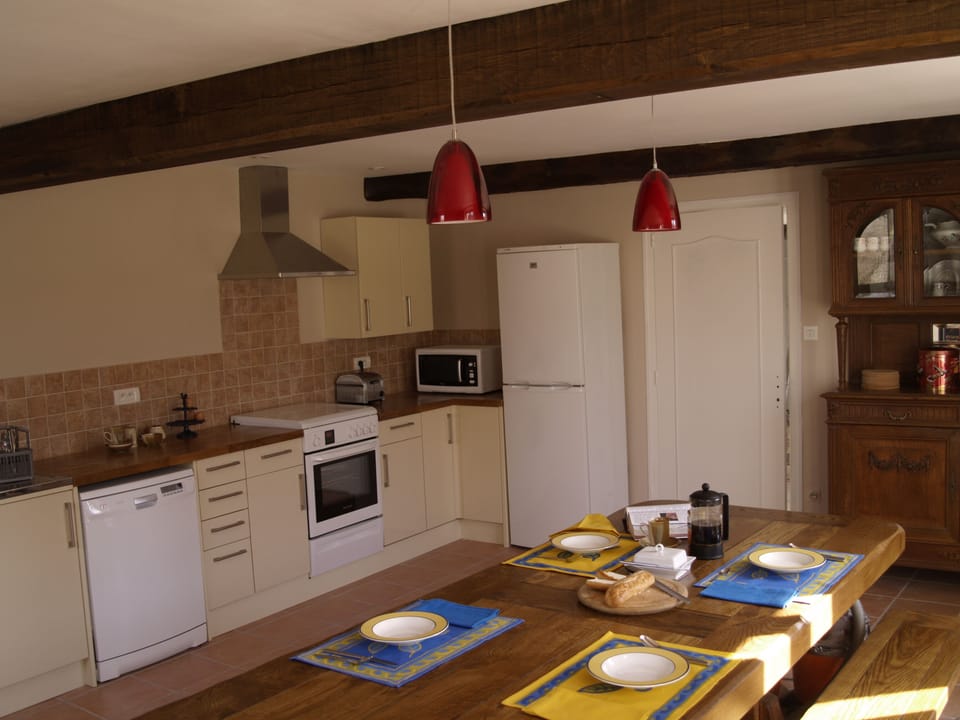 Kitchen/Diner. Very large and fully-equipped  with windows overlooking  the pool