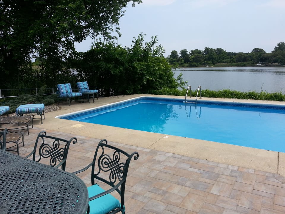 New pavers deck surrounding the pool
