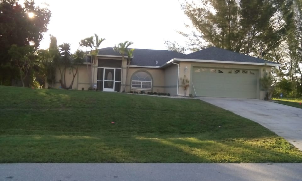 Private split bedroom ranch home with inviting lake & more! 