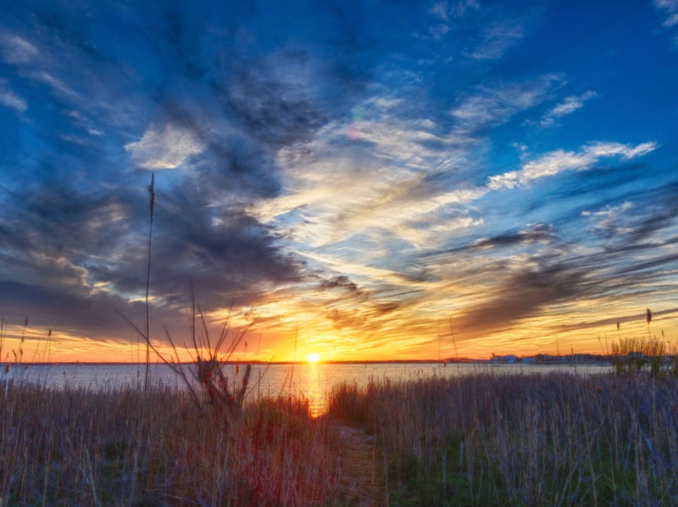 Sunsets are spectacular at Barnegat Bay, just a block away from the house.