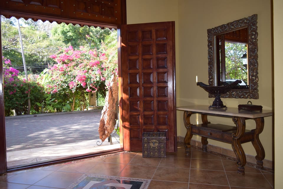 The property's design combines stylish colonial elegance with modern features.
