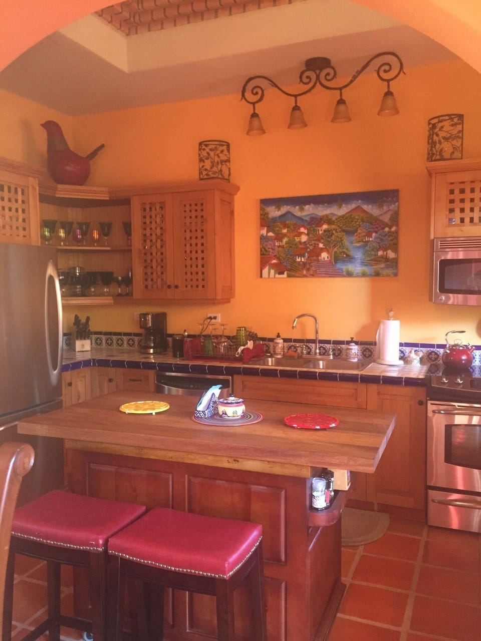 Full kitchen with dishwasher, electric stove, microwave