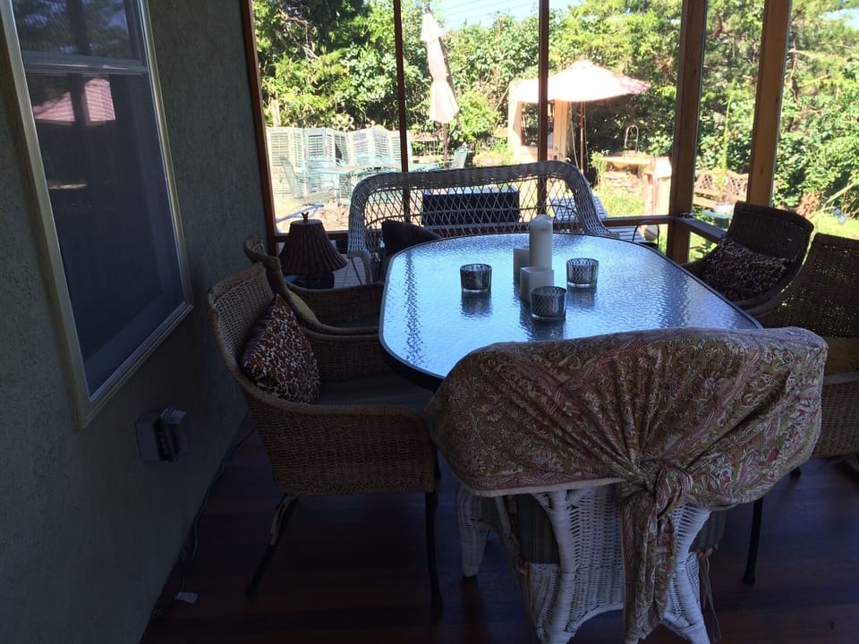 Private Screened porch with large table and seating