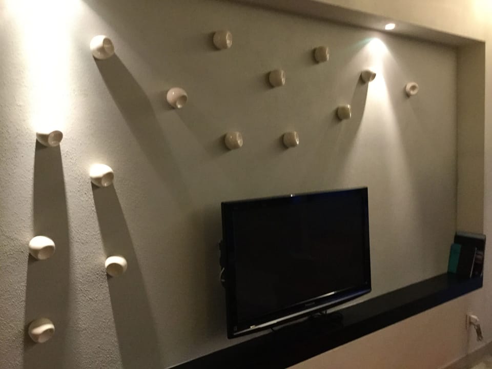 Large screen TV, plus TVs in both bedrooms.