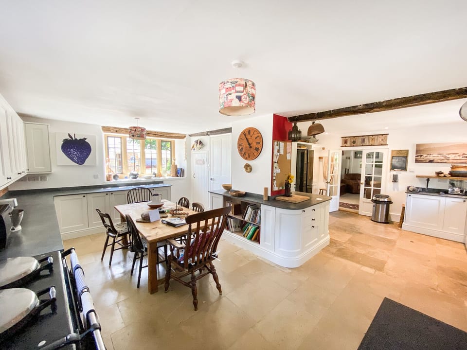 The kitchen  - side table in dining room can extend this table for large  meals