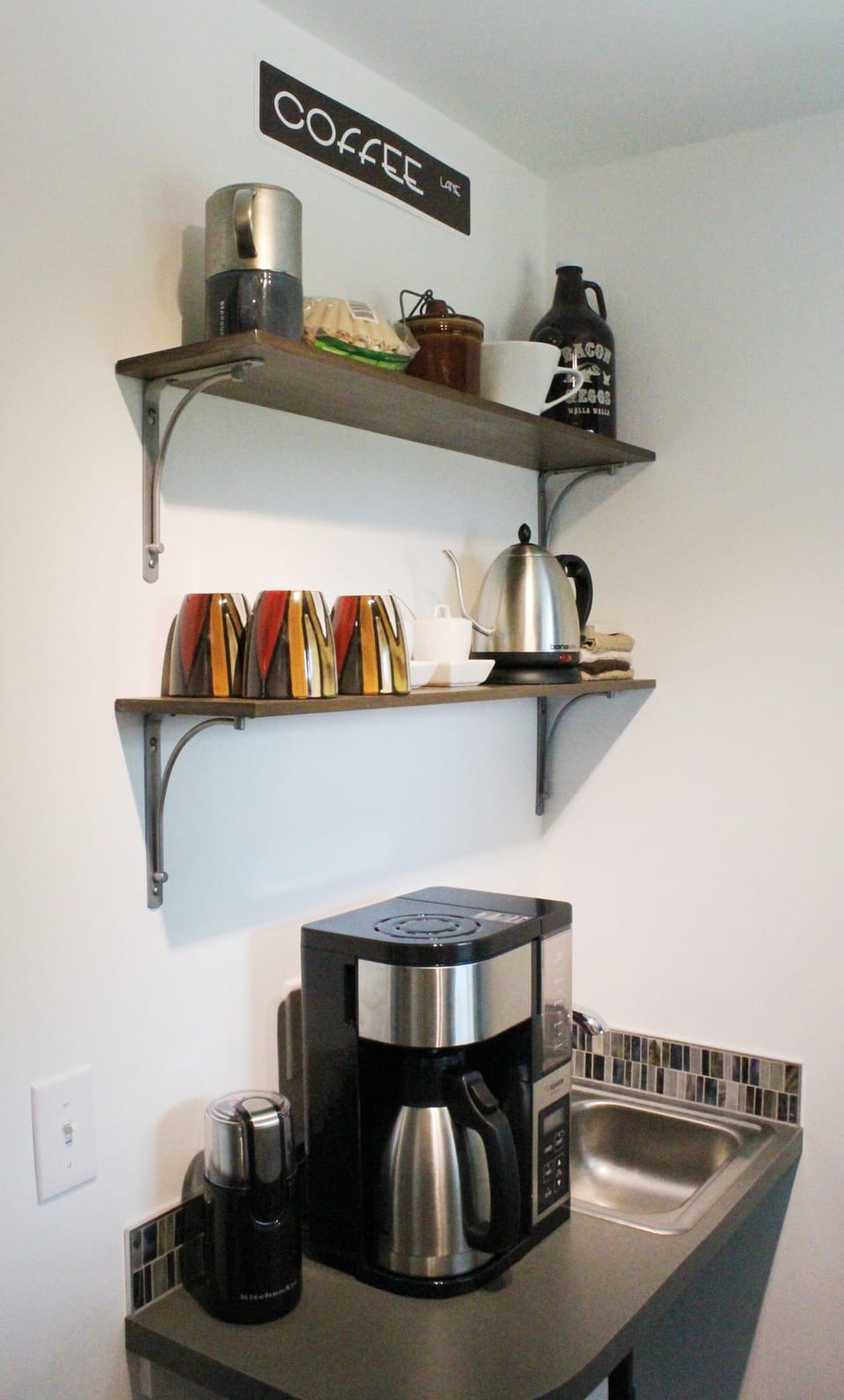 Coffee bar with built-in sink, electric tea pot, bean grinder, and more!