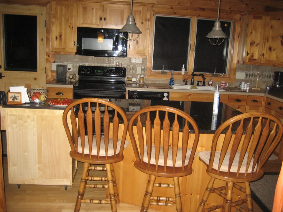 Kitchen with everything. Door leads to back patio area with Dock!