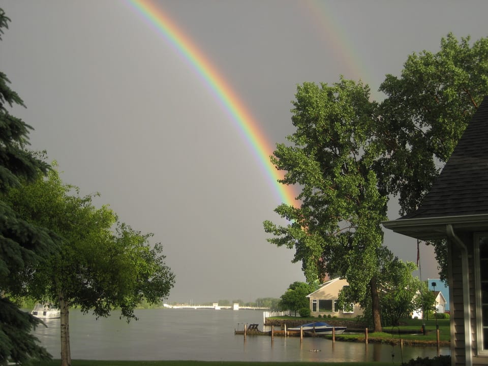 East of the home in the back. WOW a double rainbow!
