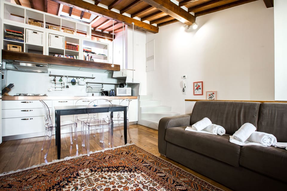 The sofa, the dining and the kitchenette