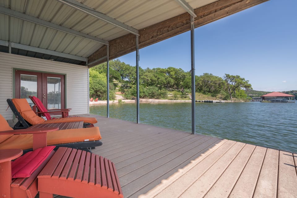 View from our dock when lake is full (currently low.) Can still kayak, SUP, swim