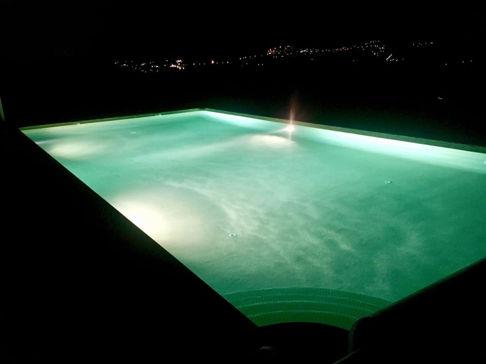 Swimming pool lights at night