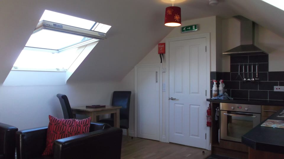Living space in Laura's Loft, private apartment at Greetham Retreat