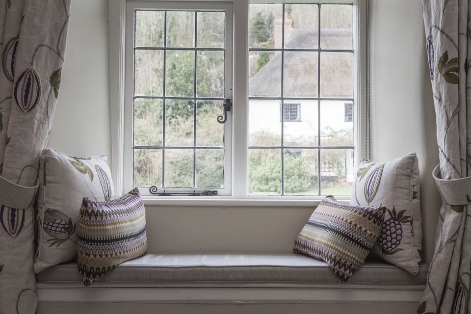 Snug up in the window seat by a warm fire with a good book and a cup of tea