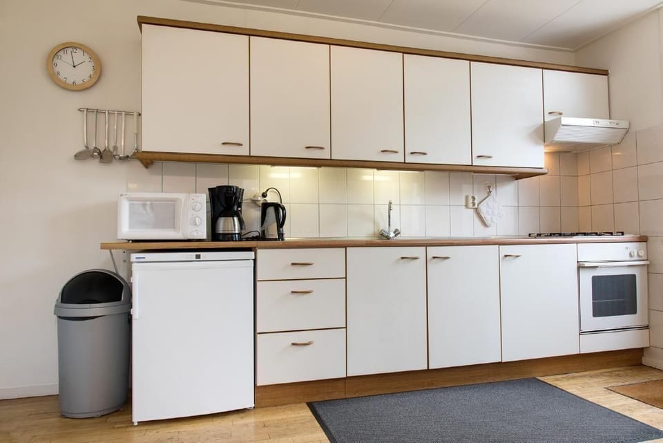 Kitchen and room.