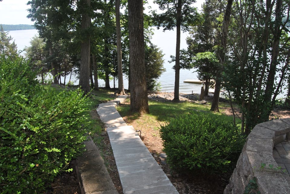 Walkway leading to the private dock.  A launching ramp located less 5 min. away