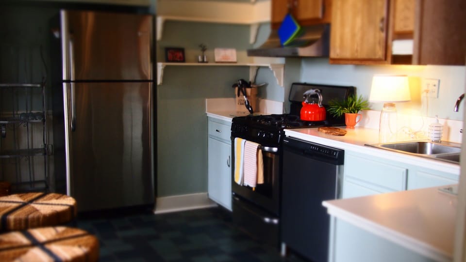 Fully outfitted kitchen with new stainless appliances.