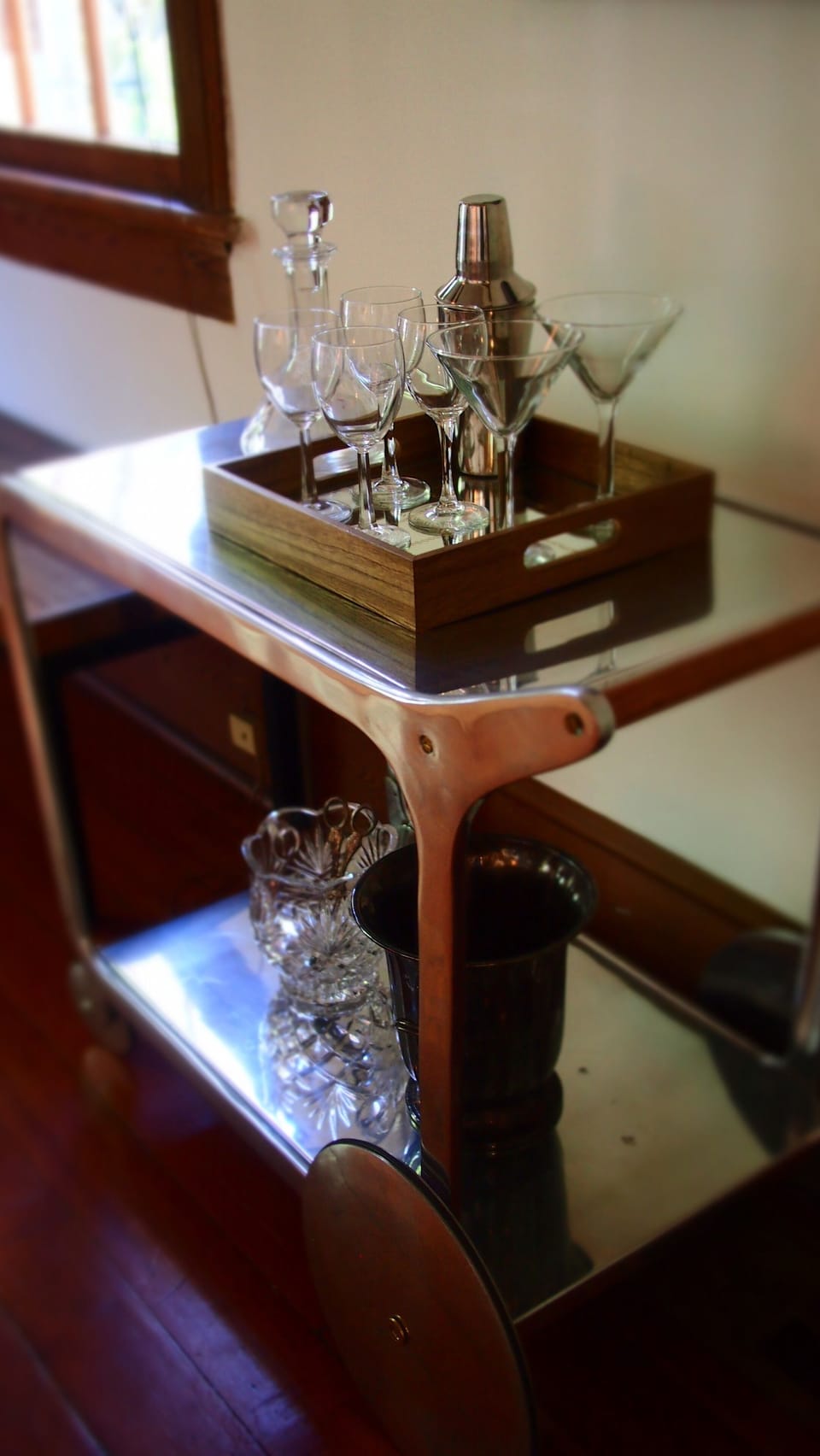 The bar cart is ready to serve you.