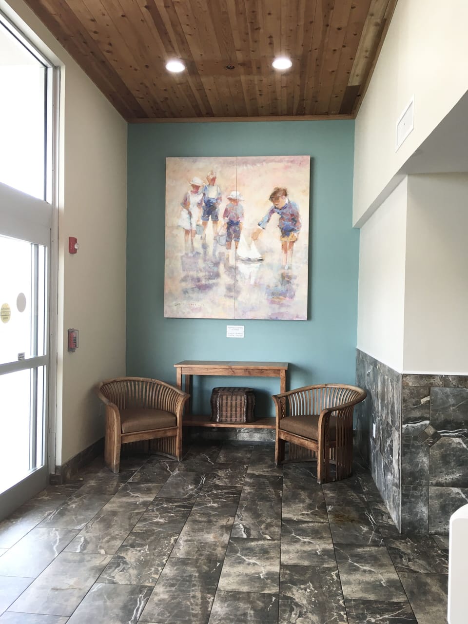 Entrance lobby with luggage cart room and 2 high speed elevators