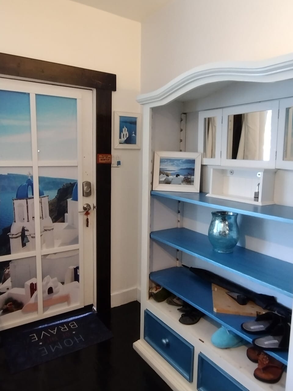Front door,  and side cabinet for keys & shoes.