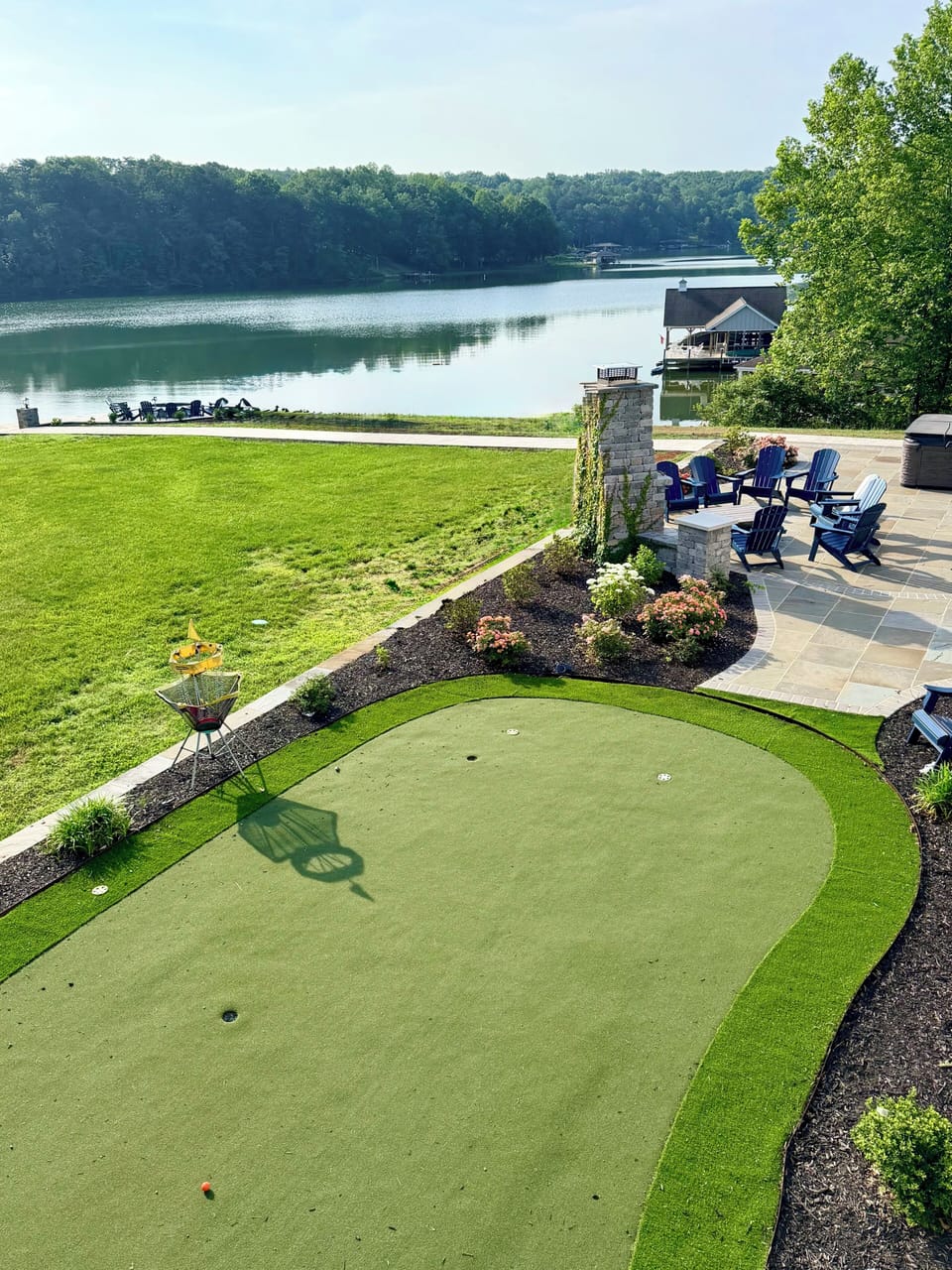 20x30 ft putting green on upper patio has mini golf obstacles and great views