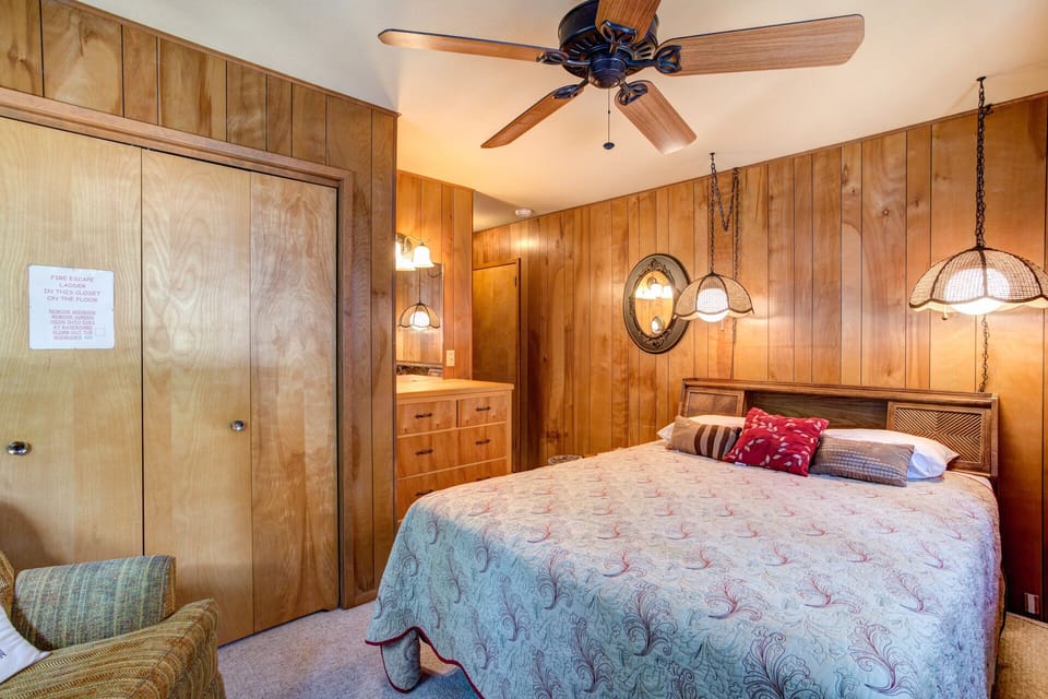 Master bedroom with queen bed and attached 3/4 bathroom