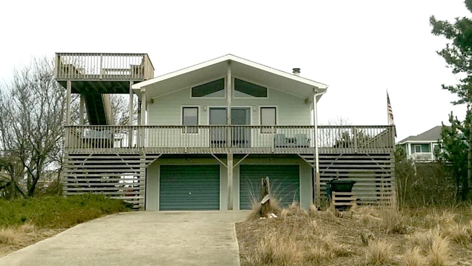 105 Canvasback Dr. - Not shown, extra parking on left, extra staircase on right.