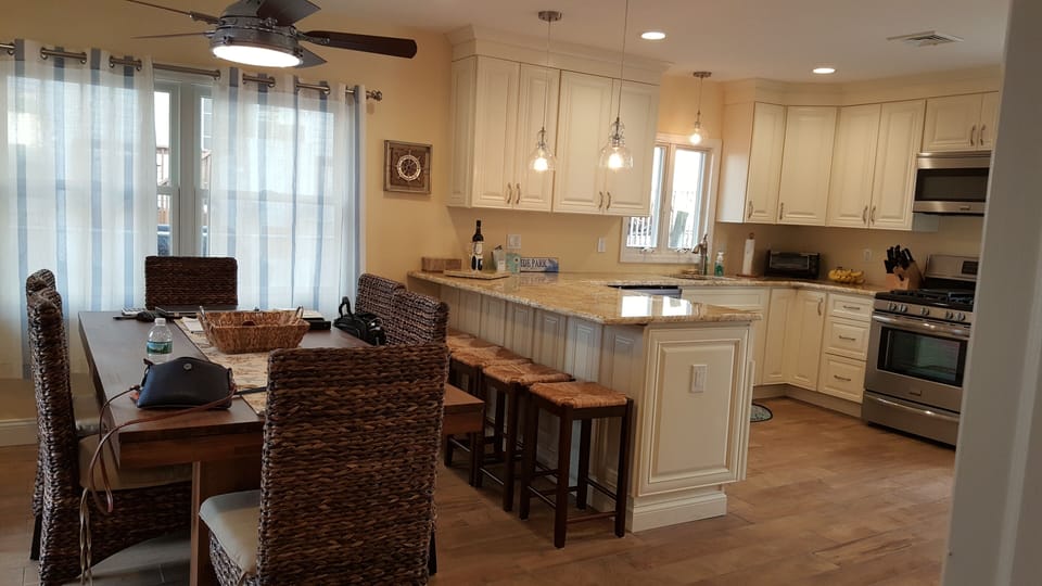 Large Kitchen/Dining room with seating for 6 and Island seating for 6