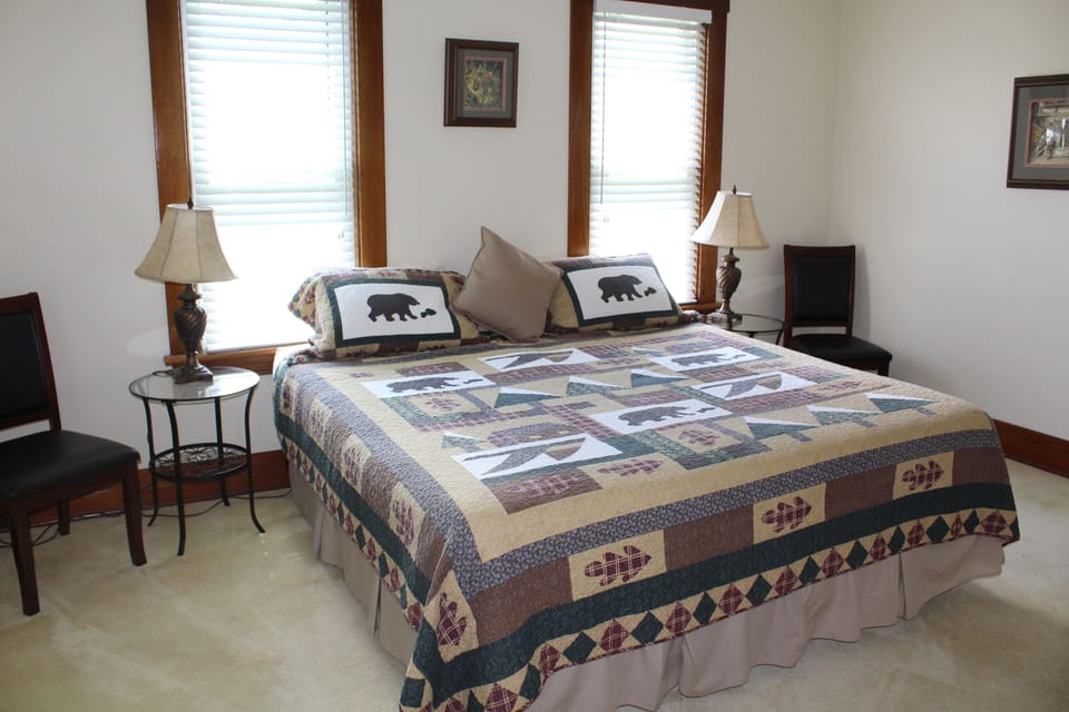 Main floor bedroom with king bed