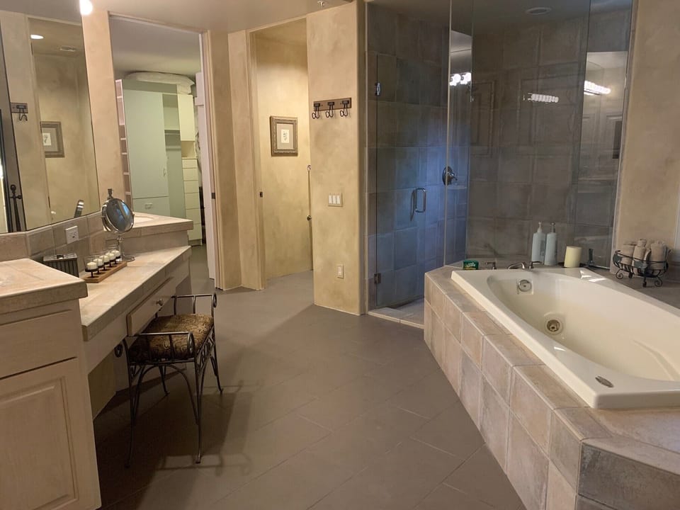 master bathroom ; walk-in closet in background