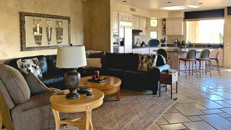family room couch with kitchen in background