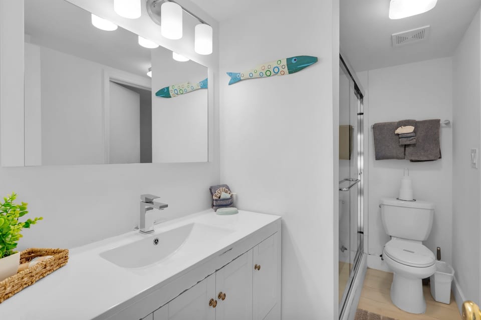 Two doors connecting Bedroom and living space.