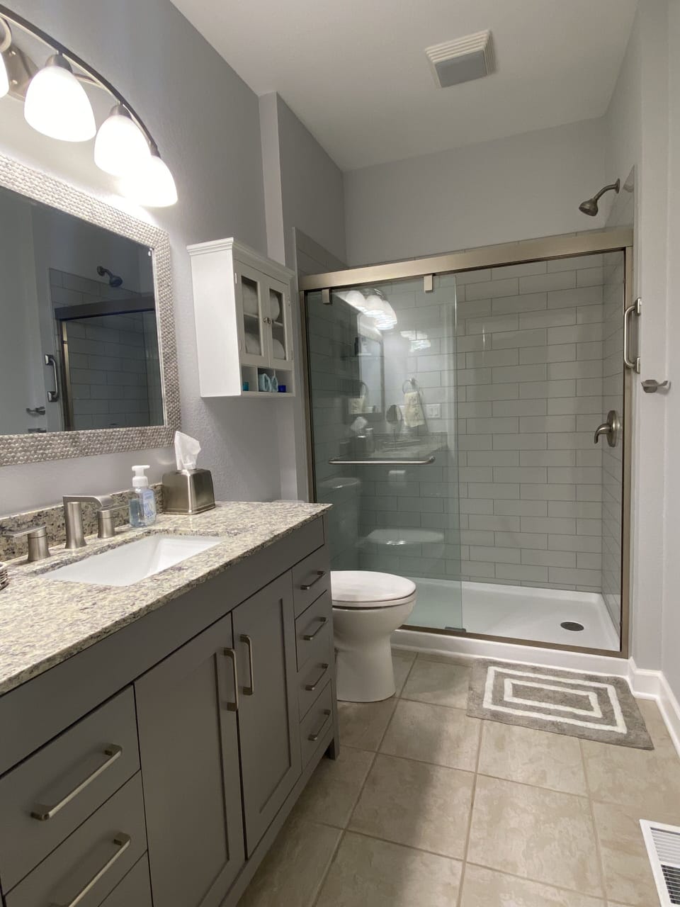 Master bathroom with sliding glass door shower