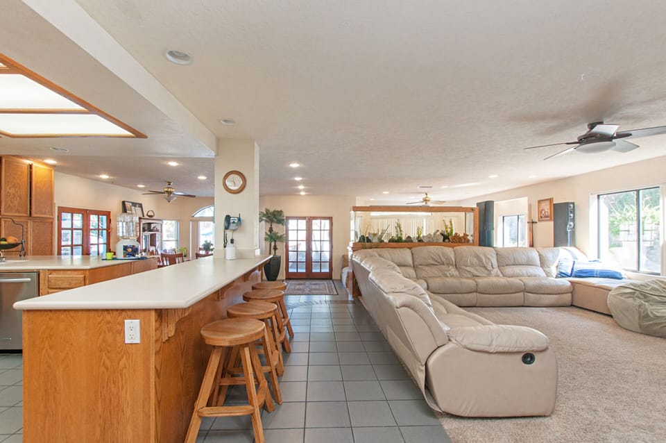 A glimpse of the open living area, including a salt water fish tank.