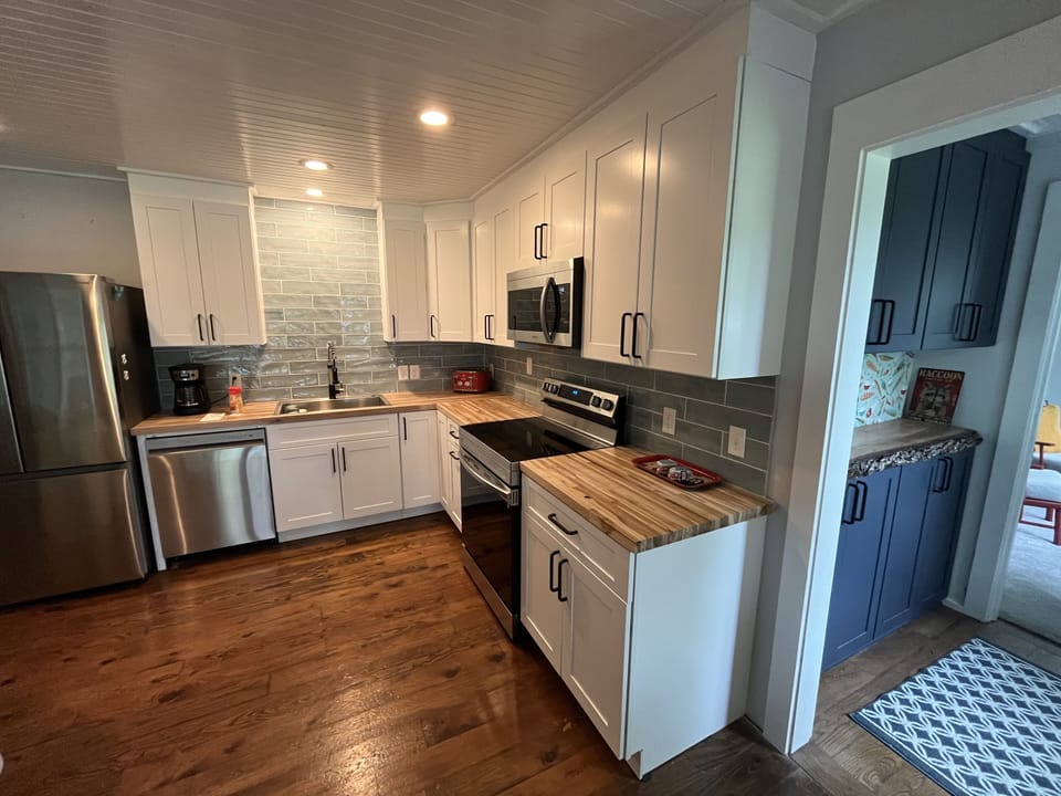 Updated kitchen 2024. All new appliances, cabinets, and tile etc.