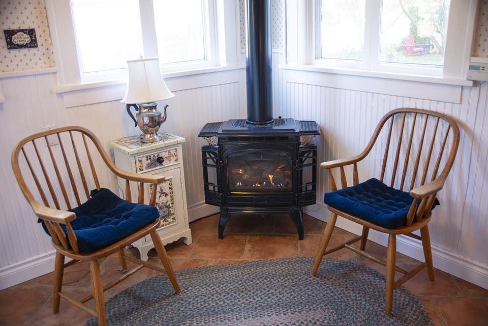 Cozy kitchen stove. great place for morning coffee or tea.