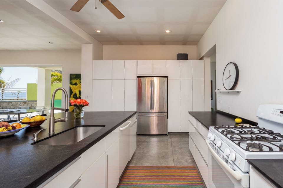 9x5 foot granite topped island and work areas....we like to cook!