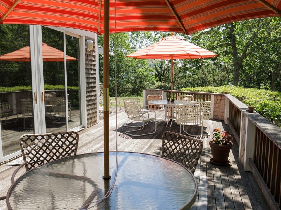Rear deck shaded outdoor seating for 10 - additional chairs available on deck