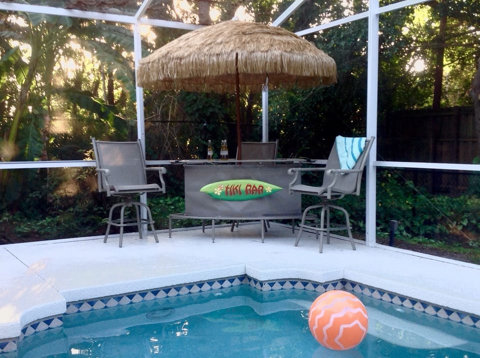 Sip a beverage poolside while your friends up north freeze their @$$ off