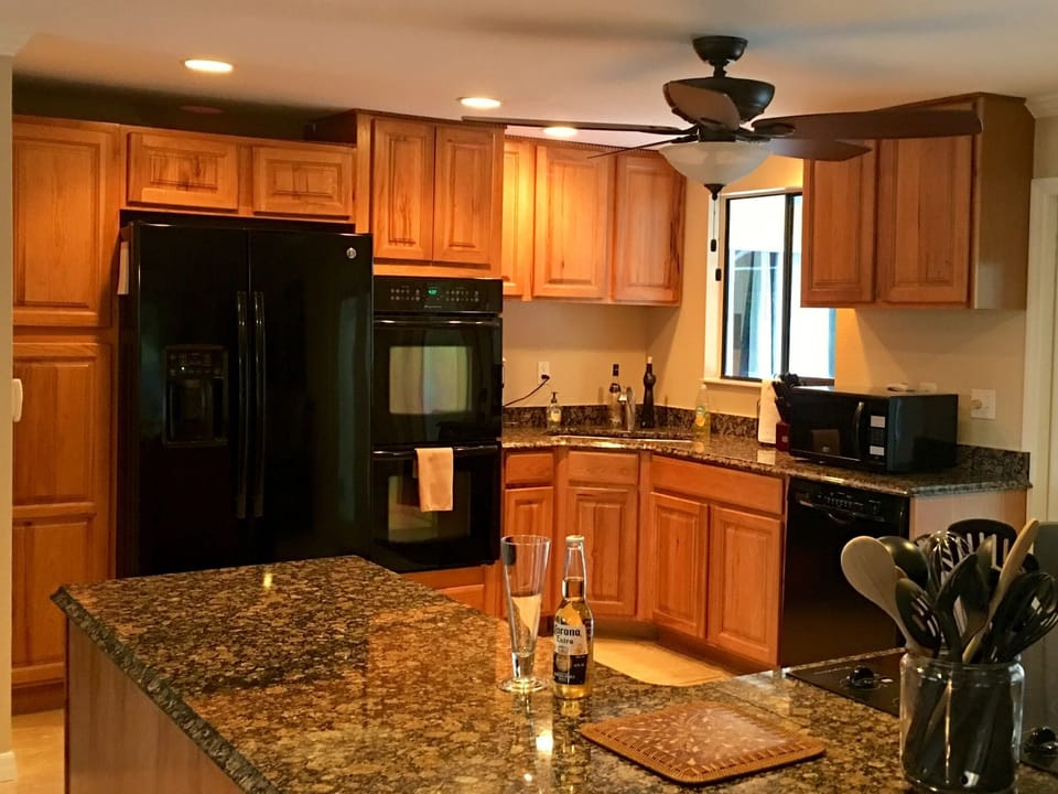 Large, extremely well equipped kitchen with pool views