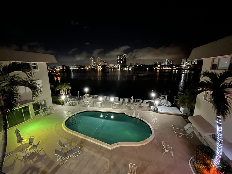 Evening Pool in front of our Condo entrance from the Cat Walk.