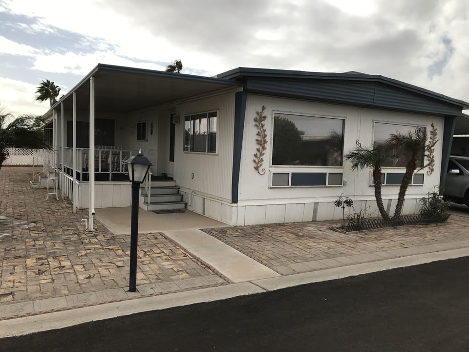 Front of house with outdoor seating porch