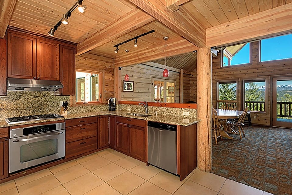 Gourmet Kitchen, Granite & Giant Wood Bar Countertops , Dining Table seats 12-14