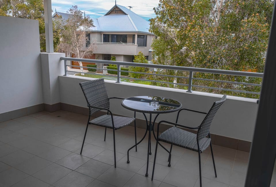 Upstairs Balcony Overlooking Quiet Street