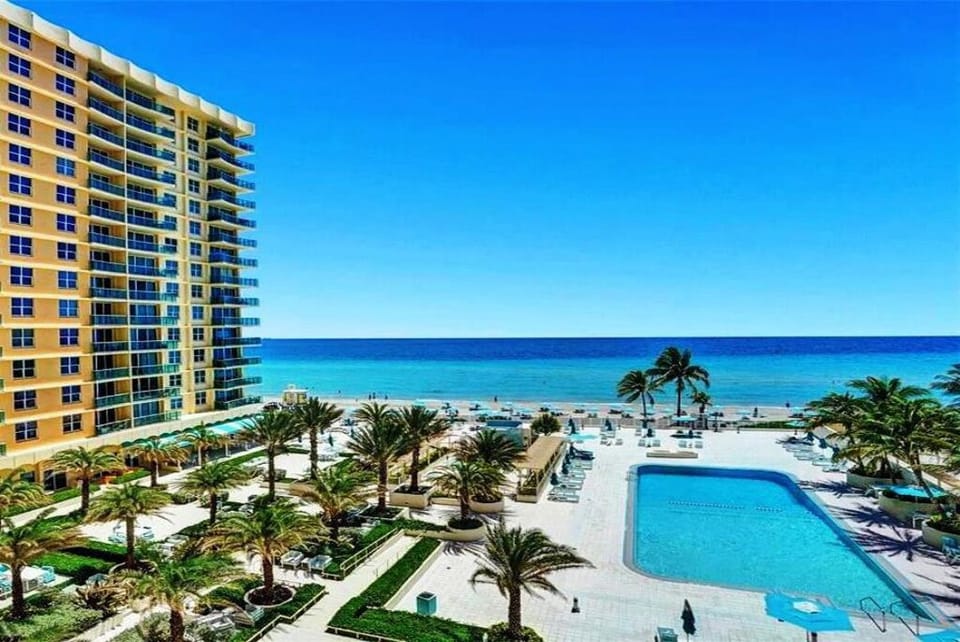 Large Pool Deck Overlooking the Beach.  Deck has Olympic Infinity Pool & Jacuzzi