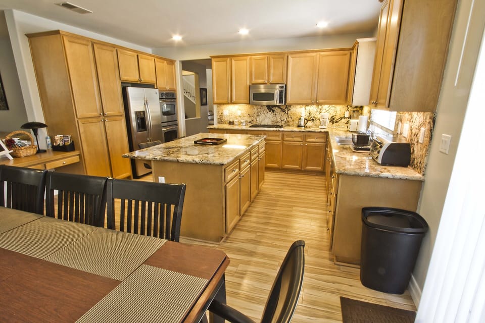 Kitchen- fully stocked with all necessary pots, pans, plates, glasses, cutlery, 