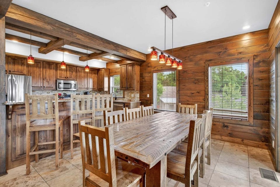 Dining room with seating for 8, additional 3 seats at the breakfast bar
